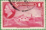 Surinam stamp with goods waggon at bauxite mine in Moengo
